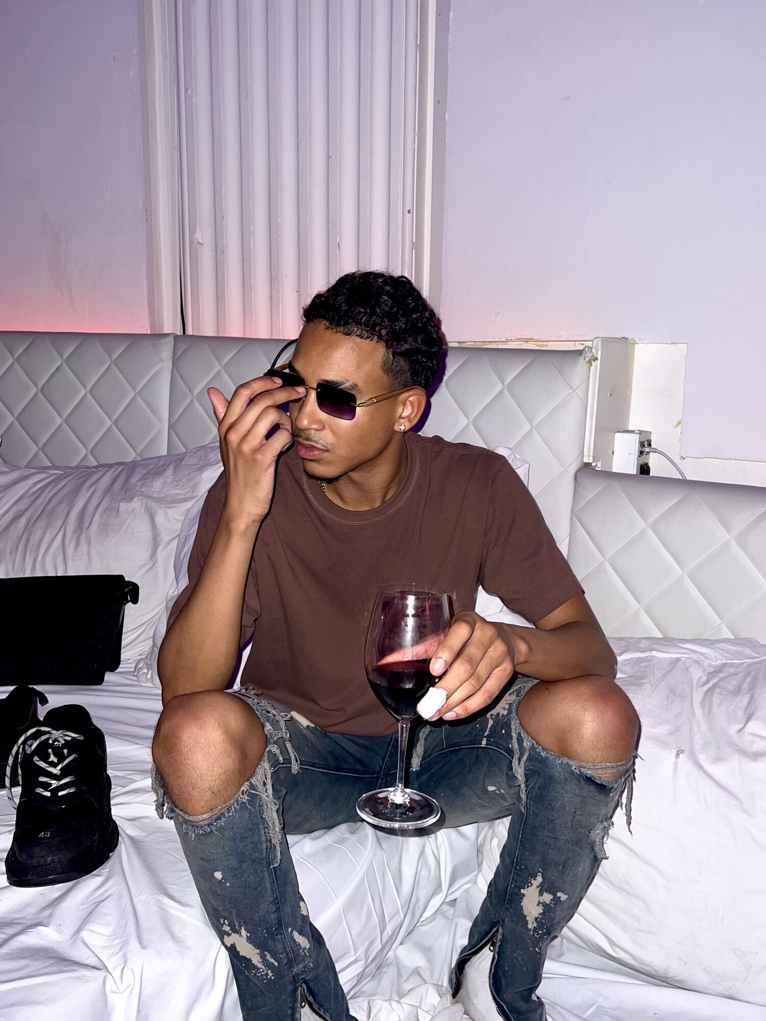 Joshua Arthur (JJDREAMSS) · Amsterdam · 2022 — Red wine and sunglasses at Supper Club