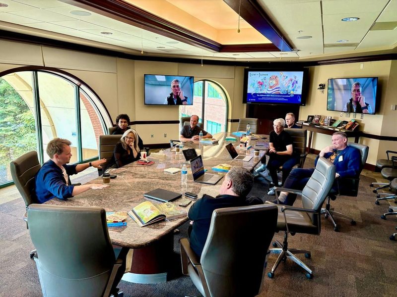 Joshua Arthur JJ youngest in Colorado boardroom board meeting 2025 Kings Collective international creative marketing practice which received Cabinet Office approval
